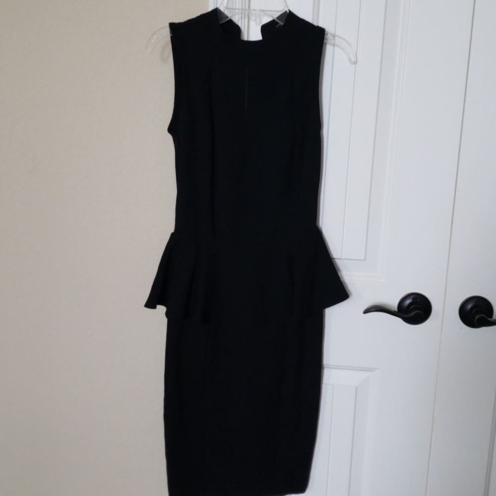 Black sleeveless dress from zara with peplum